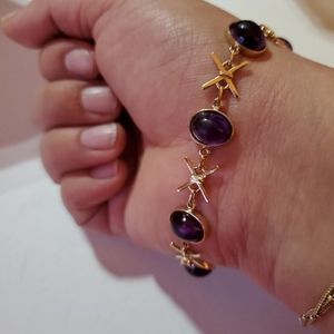 Gold flexible bangle bracelet with  amethyst stone
